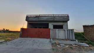 brand new single story grey structure available for sale