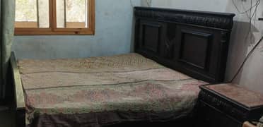 Wooden double bed