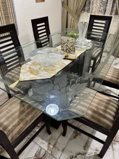 Glass top dining table with sheesham wood chairs excellent conditio