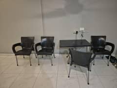 Plastic Chairs and  Table for sale