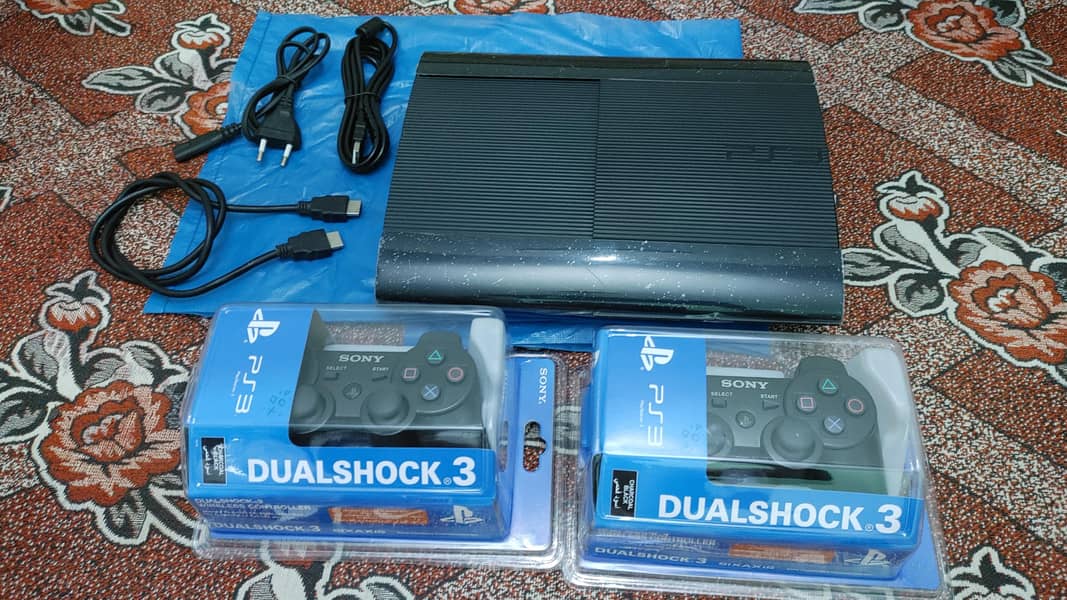 super  slim ps3 500gb/48 games installed 2 remotes wireless 2