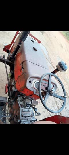 Massey Tractor 240 and trali. 82