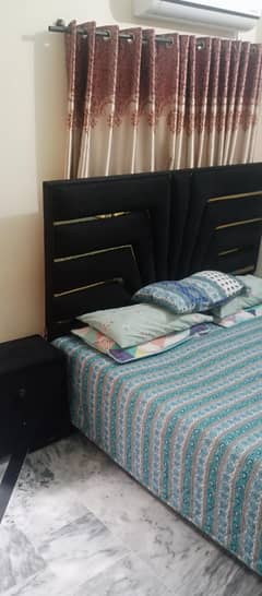 bed with two side tables