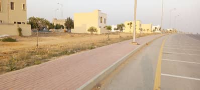 ALI BLOCK Precicnt-12 Near Grand Mosque. Park Face. Corner Category Plot Available FOR SALE