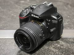 Nikon D3400,Original box,Camera Bag,Rain cover and 32Gb memory card.