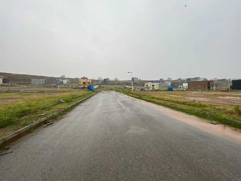 PRIME PLOT IN BLOCK L 10 MARLA FULL HEIGHTED AND SOLID INFRONT OF MASJID AND COMMERCIAL 2