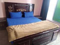 Furnished king size bed with site table and mirror table!