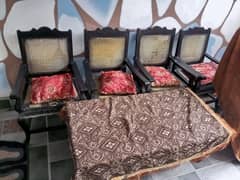 4 wooden chair with one wooden Table