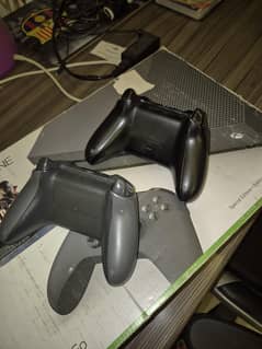 Used Xbox one S  with 2 controllers,box  and video games