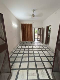 Spacious 12 Marla Upper Portion with Car Parking and Lawn for Rent in K Block, Model Town Lahore