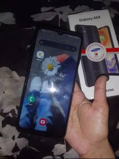 Samsung A04 with black back cover & box