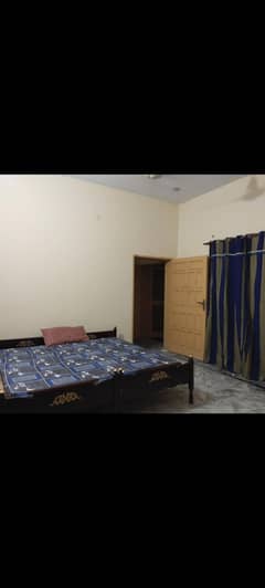 Two single beds with metresses