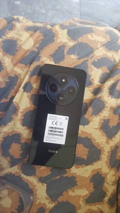 Redmi 14c 6 128 11. month warrnty original charger box available