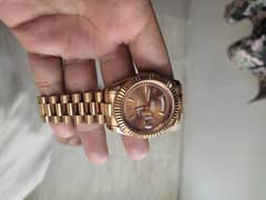 Rolex day and date watch