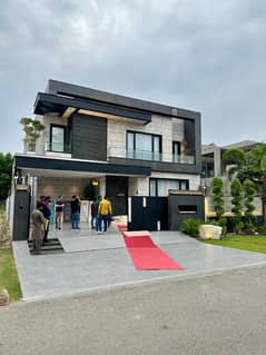 One Kanal Brand New Luxury Ultra-Modern Design Most Beautiful Full Basement Fully Furnished Home theater Bungalow For Sale At Prime Location Of DHA Lahore Near To Park Masjid & Commercial Market.