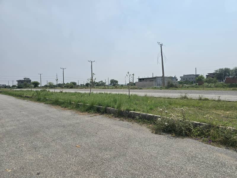 8 Marla sun face level plot next to Corner and 2nd plot from Main Double Road For sale 4