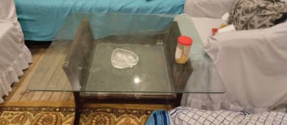 wooden table set with glass top