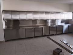 commercial stainless steel kitchen cabinetry and storage unit .