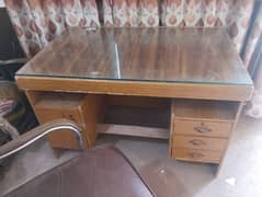 Office chair and table with glass