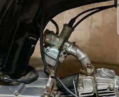 I am selling 125 carburetor and band.
