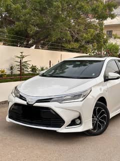TOYOTA GRANDE 1.8 X 2023 MODEL NEW RIM WHITE WITH BLACK INTERIOR 47k M