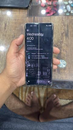 one plus 9 pro5g single line on screen 12gb ram 256gb storage