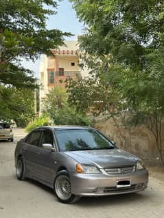 Honda civic 2002 exi cateyes