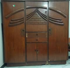 A wardrobe in good condition is available for sale.