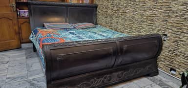 King sized sheehsham wood bed without mattress