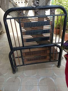 One Single Iron Bed