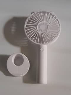 Portable mini fan.