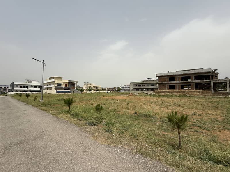 FAISAL TOWN BLOCK B 30*60 PLOT FOR SALE ON GOOD LOCATION FIRST COME FIRST AVAIL THIS BIG OPERTUINTY 11