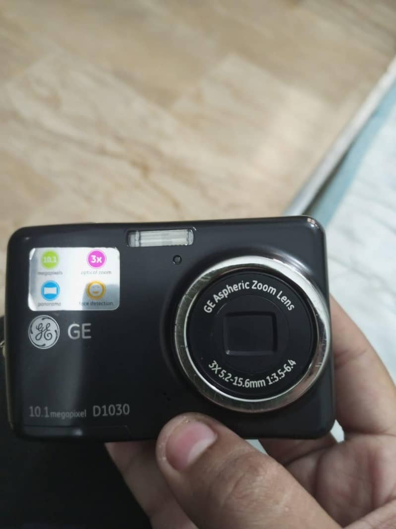 digital camera D1030 with memory card 8