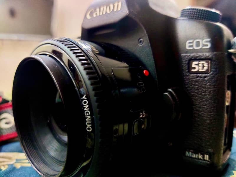 canon 5d mark ii dslr camera with 50mm llens/nikon/sony/mobile/phone 0