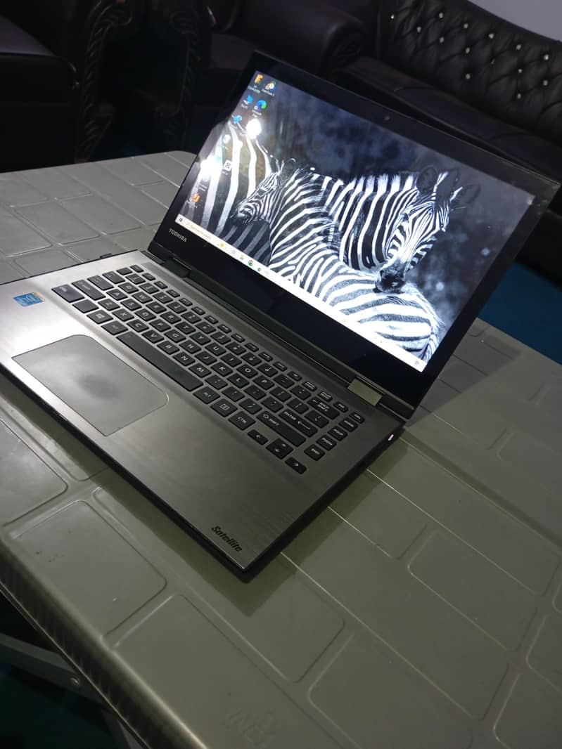 Laptop Toshiba Touch screen 10/10 condition no any problem 1