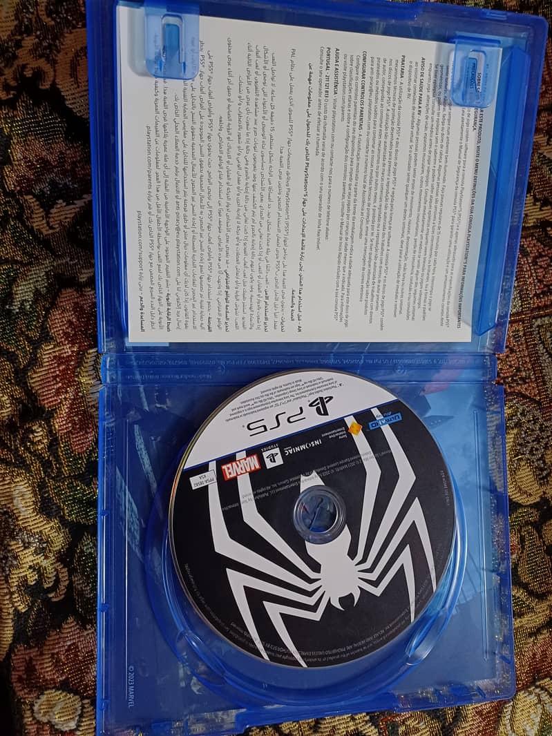 PS4 Slim Disk Edition Brand new Condition with Spiderman 2 Game 9