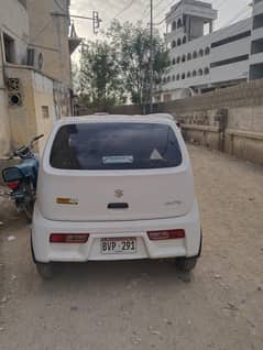 white Suzuki aulto vxr