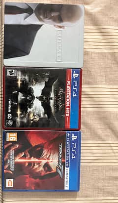 ps4 game dvds. Hit Man, Batman Arkham knight, Tekken 7