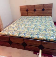 without mattress  wooden king size bed new condition
