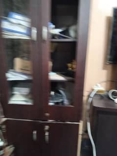 1. Three door cupboard.      2. Divider
