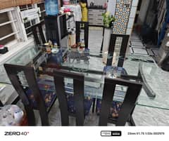 8 Chairs Dinning Table with thick 4mm glass for sale!