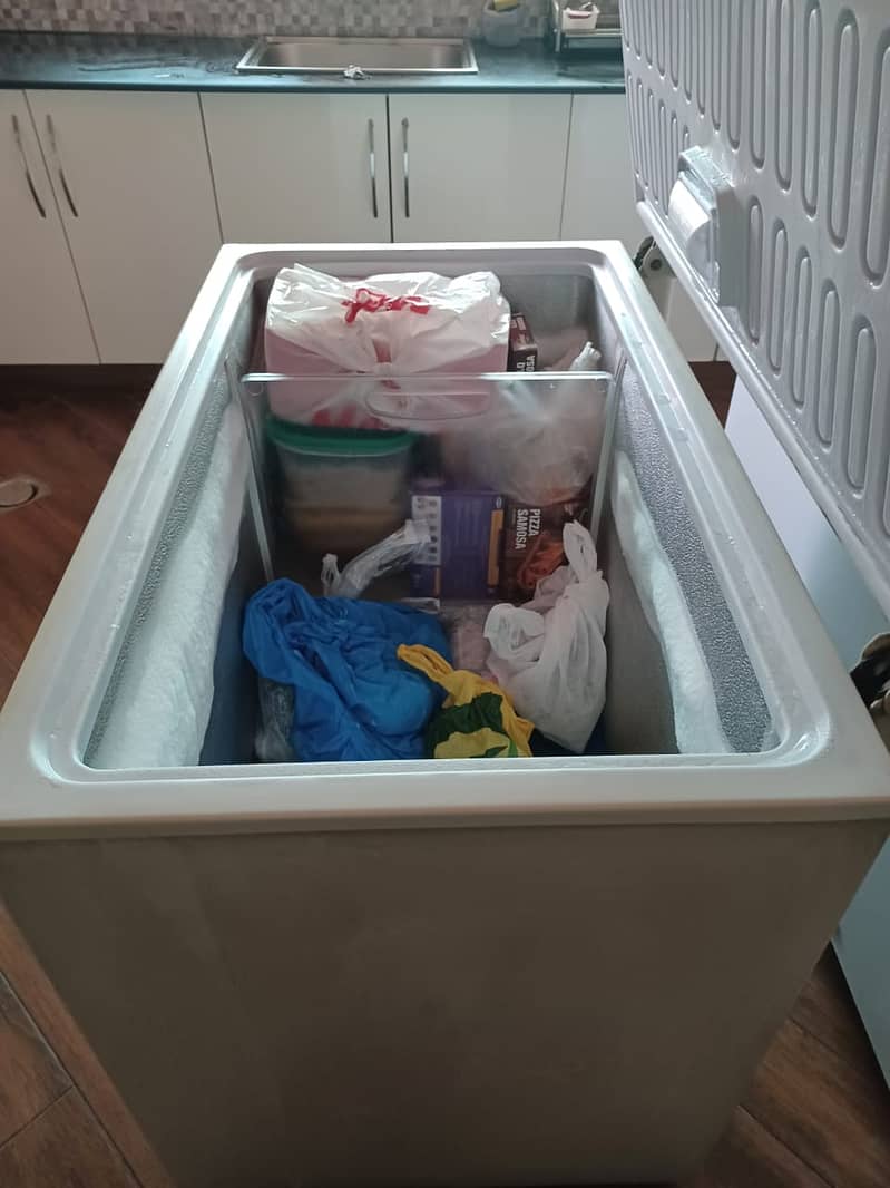 Waves deep freezer, in good running condition.  Rating 8. 8