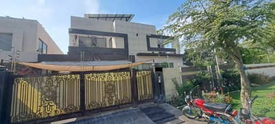 One Kanal Slightly Luxury Mazhar Munir Design Most Beautiful Full Basement Fully Furnished Home Theater Bungalow Solar System Installed For Sale At Prime Location Of DHA Lahore Near To Park Masjid & Commercial Market.