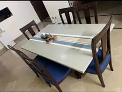 dining table with 6 chairs and new poshish urgent sell