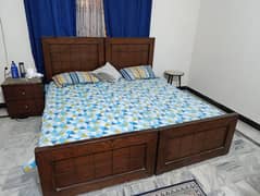 2 single Wooden Beds
