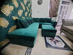Velvet L shaped sofa green