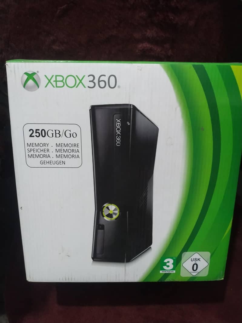 Xbox 360 elite with two controllers and motion comera 0