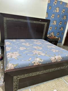 Bed and dressing table with side tables