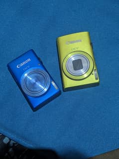 Canon IXY 100F (blue) and 600F (lime)