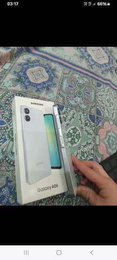 samsung a06  6gb ram and 128gb memory white color  box and warranty